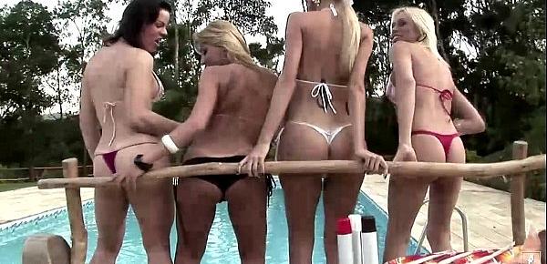  Four messy shemales in bikini fuck like crazy by the pool